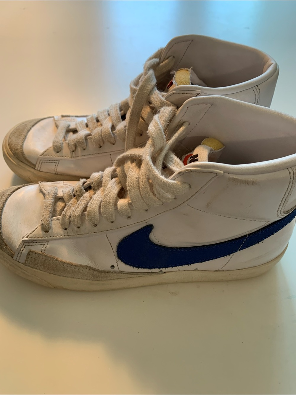 Nike White High-Top Sneakers with Blue Swoosh and Suede Accents